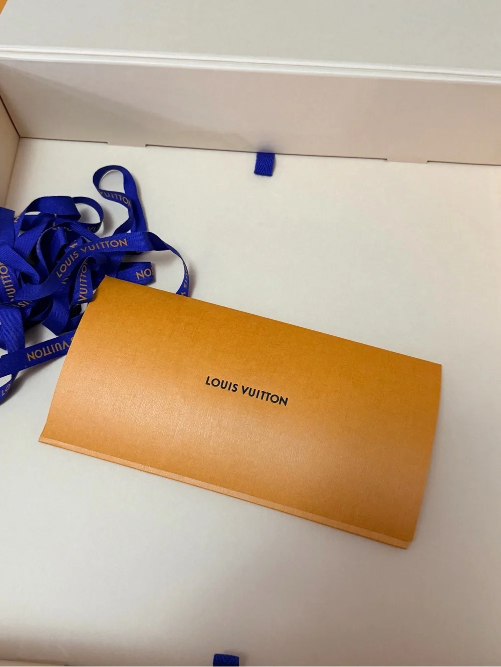Louis Vuitton Orange Box with Branded Documents
